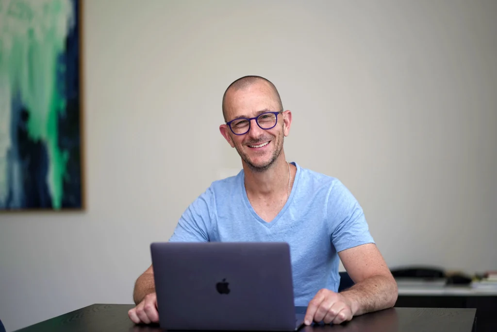 Marc Wiesner coaching a couple online from his office